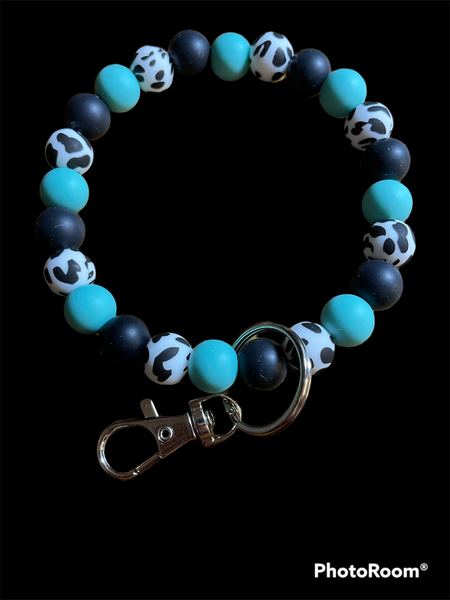 Teal Cow Wristlet